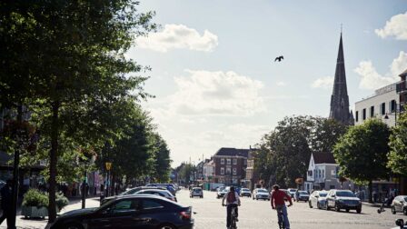 Men cycling through the town - Romford - Beresfords Estate agents - Essex