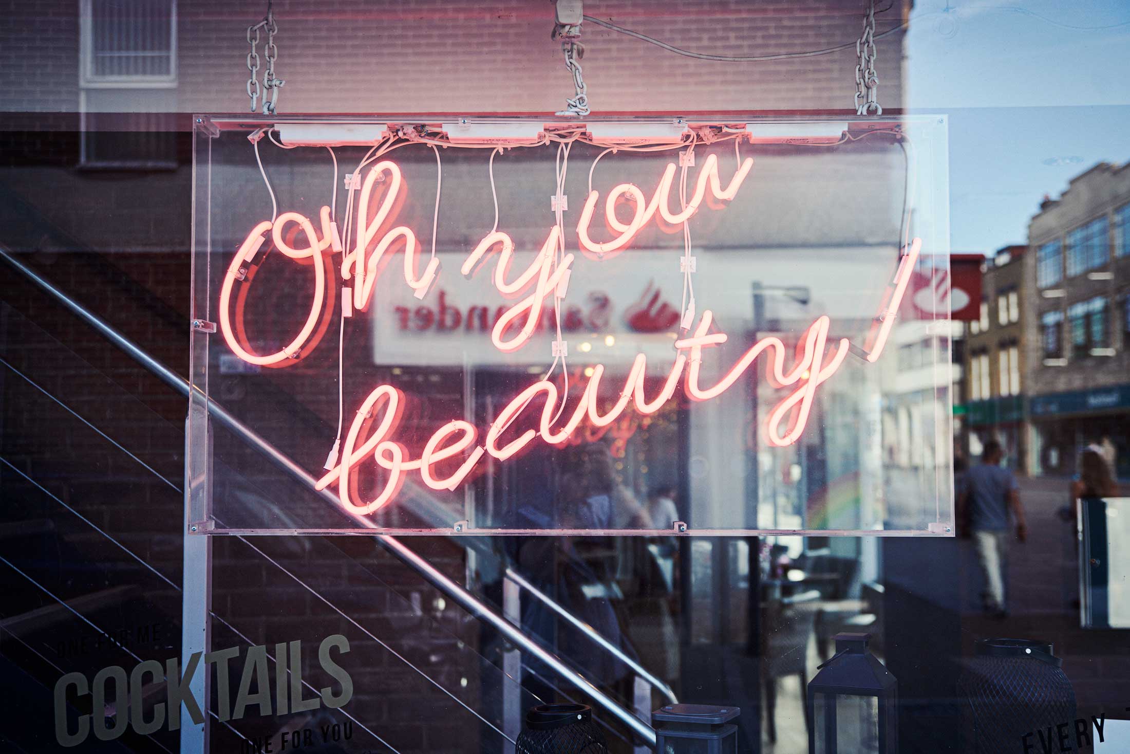 'Oh you beauty!' neon sign in restaurant window - Brentwood - Beresfords Estate agents - Essex